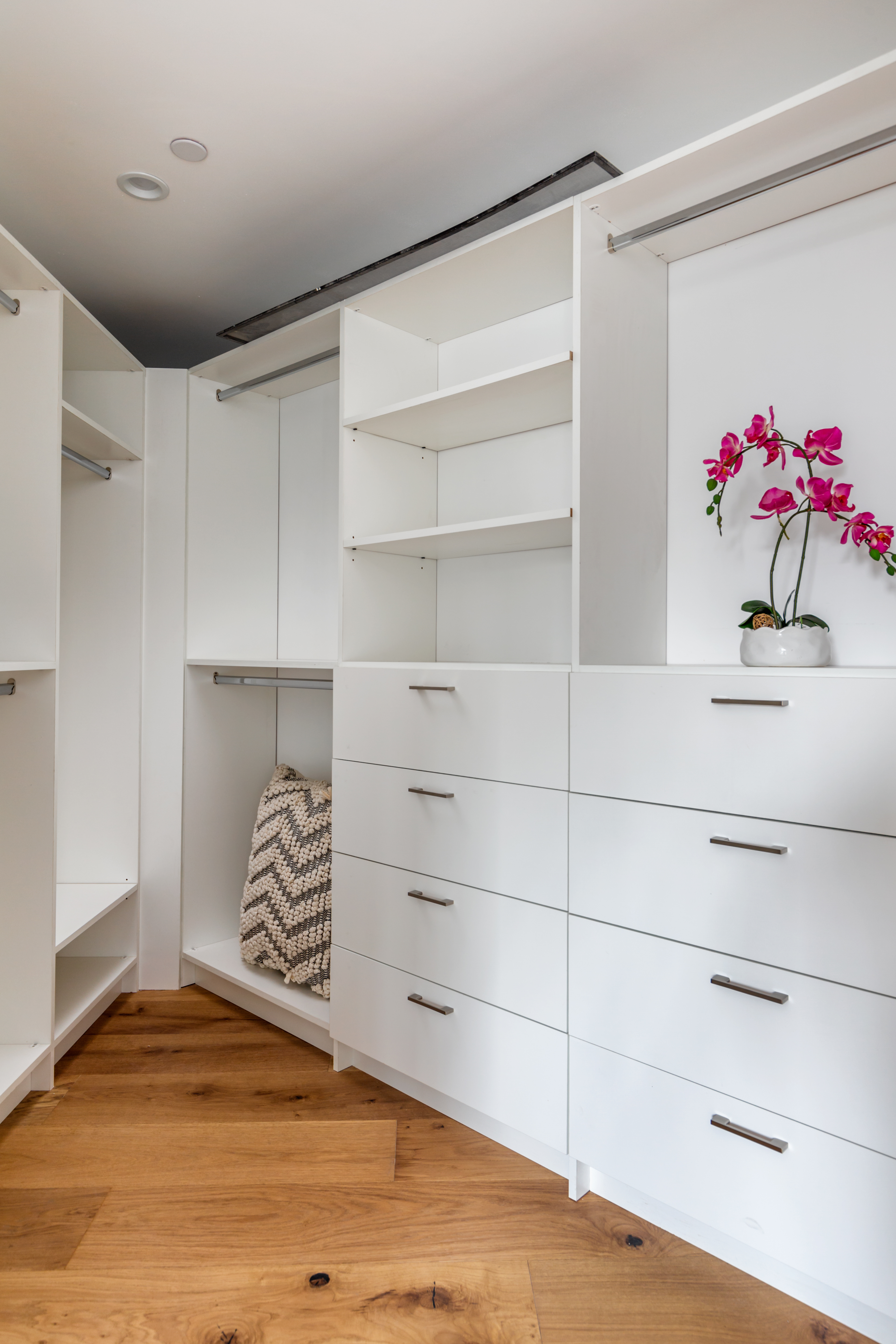 Floor-to-ceiling built-in storage with integrated cabinetry