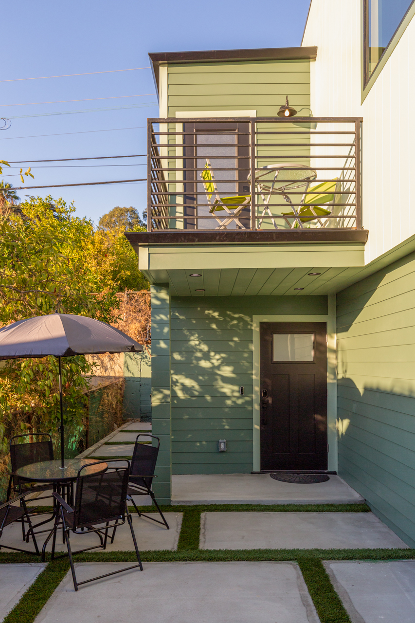 Modern home with a projecting upper-level deck